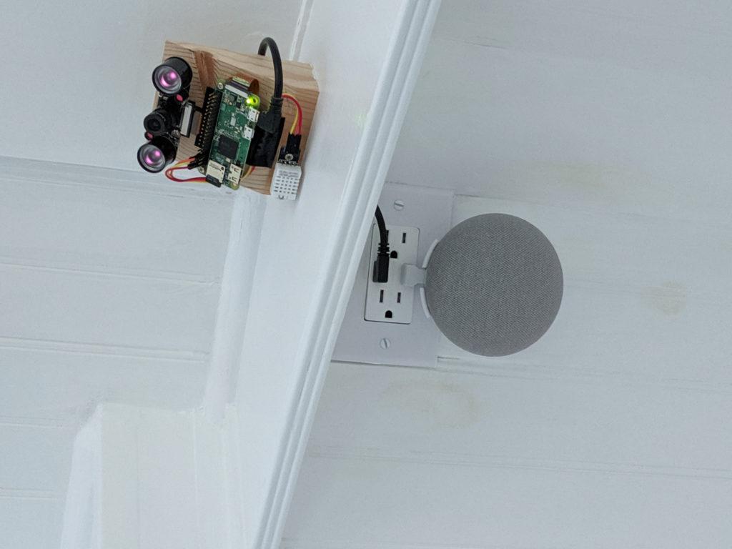 a google home mini in the tiny house storage loft